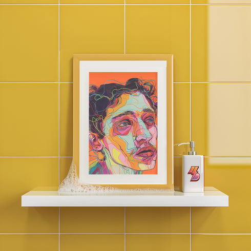Vibrant digital portrait of a person with angular features against a bright orange background. The face is composed of bold, colorful lines and shapes in various hues including purple, yellow, pink, and teal. The subject has tousled dark hair and a contemplative expression, with prominent eyes and lips. The style is reminiscent of expressive, contemporary digital art.